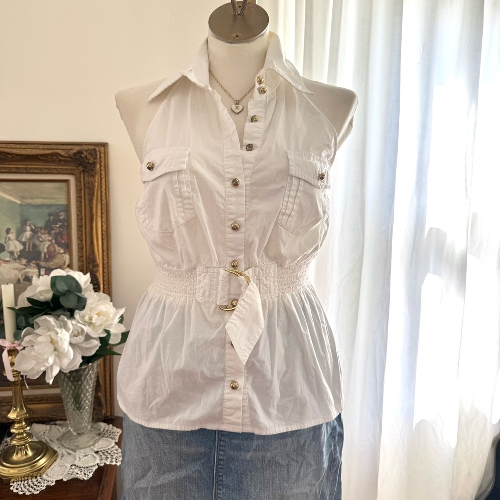 White halter top with gold buttons.